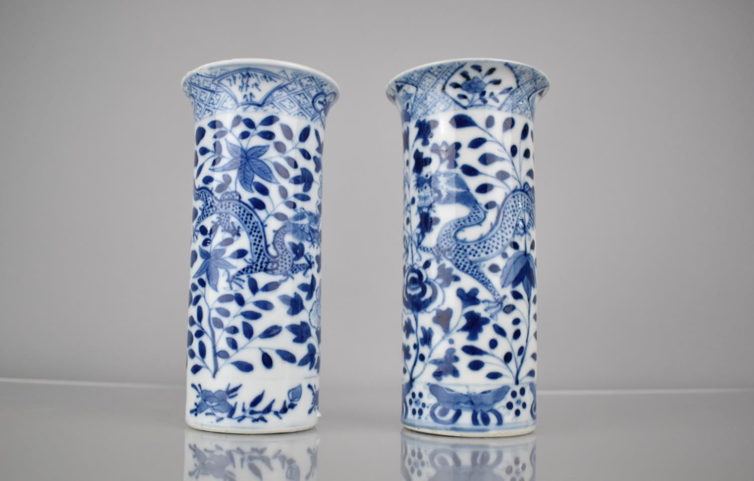A Near Pair of 19th/20th Century Chinese Porcelain Sleeve Vases Decorated with Dragons Amongst
