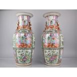 A Large Pair of Chinese Porcelain Famille Rose Medallion Vases decorated in the Usual Manner with