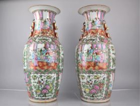 A Large Pair of Chinese Porcelain Famille Rose Medallion Vases decorated in the Usual Manner with