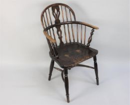 An Early 19th Century Windsor Arm Chair with a Low Hooped Back over Pierced Splats, Solid Elm