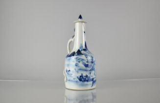 A Chinese Porcelain Blue and White Water Bottle and Cover with Single Handle in the Form of Crawling