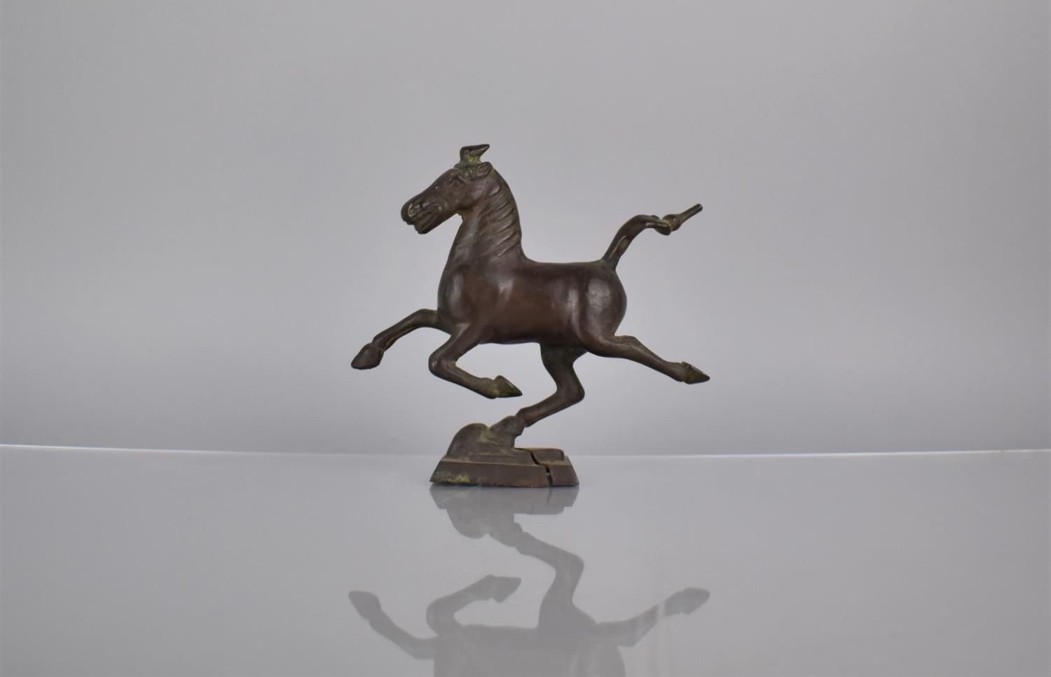 A Chinese Cast Bronze Study of The Flying Horse of Gansu, 18cms High. Condition: Not Perfect with - Image 2 of 3