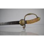 A 19th Century Hunting Sword with Brass Hilt, Shell Guard and Horn Handle, Blade 55cms and Total