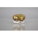 A 19th Century Small Enamel Box, Finely Painted with FLoral Swags, Gilt Scrolls and Blue Trim having