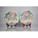 A Pair of Chinese Porcelain Plates Decorated in the Famille Rose Palette with Battle Scene, the