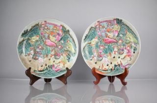 A Pair of Chinese Porcelain Plates Decorated in the Famille Rose Palette with Battle Scene, the