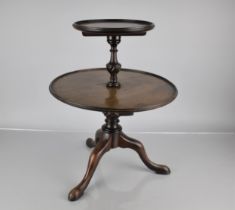 A 19th Century Miniature Mahogany Dumb Waiter with Two Dished Shelves Supported on a Carved Stem and