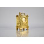 A 19th Century Gilt Bronze Carriage Clock of Architectural Form with Reeded Columns and Foliate