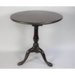 A Mid 18th Century George II Virginia Walnut Tripod Table with a One Piece Circular Top Supported on