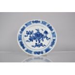 A Chinese Porcelain Blue and White Crackle Glazed Plate Decorated with Precious Objects, Scrolls