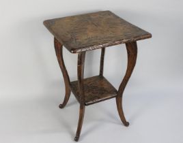 A Late 19th Century Japanese Export Carved Wooden Centre Table with a Solid Top over Four Out