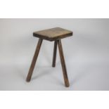 A 19th Century Primitive Welsh Ash Work Stool with Solid Plank Top over Three Chamfered Tapering