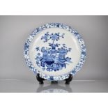 A Large Chinese Porcelain Blue and White Charger decorated with Antique Vases of Flowers, Precious