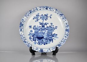 A Large Chinese Porcelain Blue and White Charger decorated with Antique Vases of Flowers, Precious