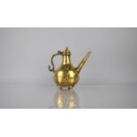 A 19th Century Brass Islamic Coffee Pot/Ewer with Hinged Ogee Cover and Scrolled Handle, Straight