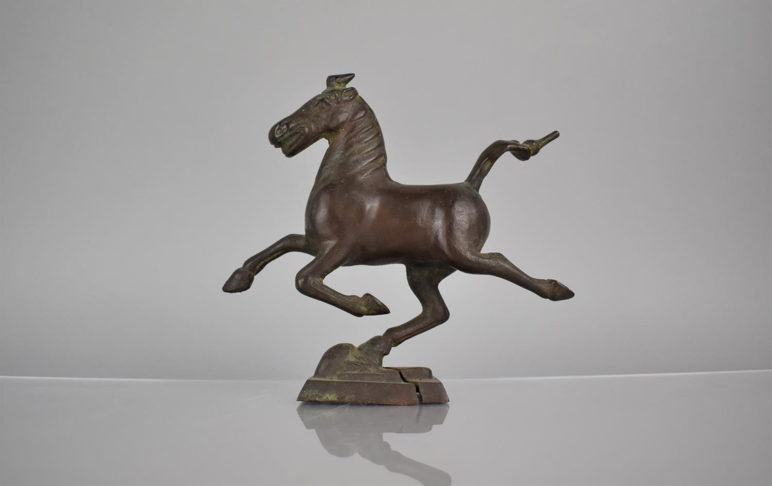 A Chinese Cast Bronze Study of The Flying Horse of Gansu, 18cms High. Condition: Not Perfect with