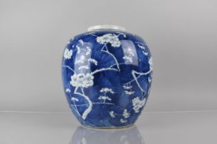 A Large 19th Century Chinese Porcelain Blue and White Prunus Pattern Jar, Four Character Mark to