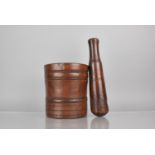 A Large 19th Century Heavy Treen Pestle and Mortar, Both of Turned and Ribbed Form, Pestle 29cms