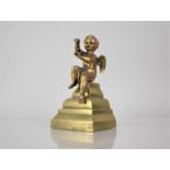 A Polished Bronze Cherub in Seated Position, Lozenge Mark to Base, Mounted on Tapering Base, 18cms