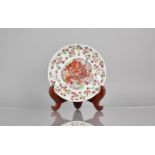 A Chinese Porcelain Dish of Reeded Form decorated in the Fencai Palette with Central Red Dragon