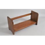 An Edwardian Mahogany Book Stand, 44cms Wide