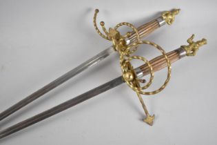 A Pair of Ornamental Gilt Decorated Swords with King and Queen Finials, Each 106cms Long