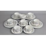 A Coalport April Pattern Service to comprise Seven Cups, Seven Saucers, Four Side Plates, Four Small