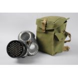 A Vintage Gas Mask in Canvas Carrier