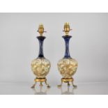 A Pair of Early 20th Century Doulton Lambeth Vases of Bottle Form with Flared Elongated Neck,
