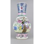 A Reproduction Chinese Porcelain Vase Decorated with Applied Enamels in the Famille Rose Palette