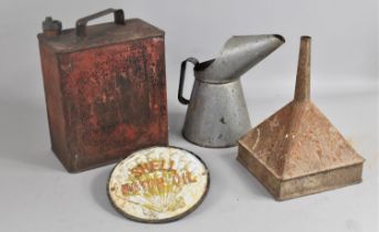 A Collection of Vintage Motoring Items to include Oil Cans, Funnel, Shell Motor Oil Plaque Etc