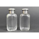 A Pair of Silver Topped Glass Dressing Table Scent Bottles, Hallmark for London 1876 by T.W. (Thomas