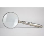 A Modern Large Desktop Magnifying Glass with Silver Plated Turned Handle and Frame, 26cms Long