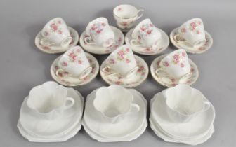 A Part Edwardian Shelley White Glazed Tea Set together with Rose Pattern Cups and Saucers