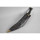 A Vintage Kukri Knife with Leather Scabbard Complete with Two Daggers, Leather Frog