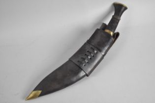 A Vintage Kukri Knife with Leather Scabbard Complete with Two Daggers, Leather Frog