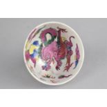 A 19th/20th Century Chinese Porcelain Tea Bowl Decorated in Polychrome Enamels with Pink Dragon,