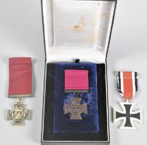 A Collection of Reproduction Military Medals to include German Iron Cross and Two Facsimile Victoria