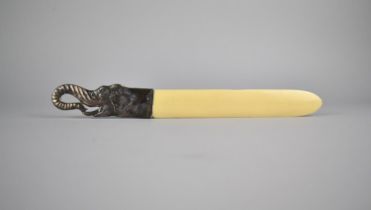 A Reproduction Bone and Silver Page Turner with Elephant Head Handle, 26.5cm long