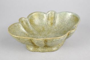 A Reproduction Chinese Celadon Glazed Dish of Reeded Oval Form, 15.5cm wide