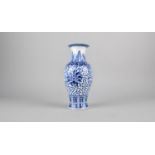 A Chinese Blue and White Baluster Vase Decorated in a Floral Motif, 20.5cm high