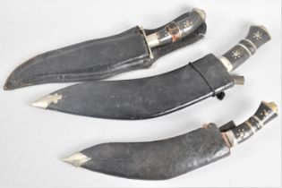 A Collection of Three Vintage Kukri Knives with Leather Scabbards