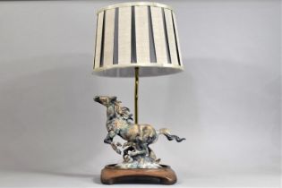 A Modern Table Lamp, The Wooden Base Mounted with Patinated Metal Study of Galloping Mustang,