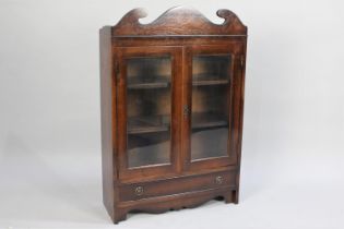 A Mid 20th Century Wall Hanging/Free Standing Display Cabinet with Base Drawer and Swan Neck