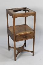 A 19th Century Mahogany Gentleman's Wash Stand with Centre Drawer and Circular Cut Outs for Wash