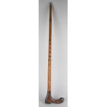 A Late 1930's Scottish Carved Walking Stick the Novelty handle in the Form of a Steel Capped Boot,