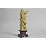 A Late 19th Century Chinese Carved Soapstone Figure, Modelled Standing Supporting a Basket of