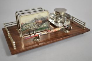 An Edwardian Desktop Ink and Stationery Stand with Silver Plated Gallery, Letter Rack and Pen