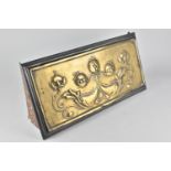 An Arts and Crafts Brass Panel Mounted on Cast Iron Fireplace Vent Decorated with Embossed