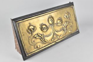 An Arts and Crafts Brass Panel Mounted on Cast Iron Fireplace Vent Decorated with Embossed